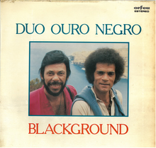 Foto dos membros do grupo "Duo Ouro Negro" com nome do grupo e título do álbum