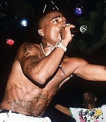 Tupac Shakur (rapper), performing live.jpg