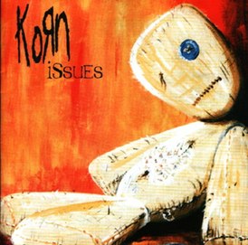 Обложка альбома Korn «Issues» (1999)