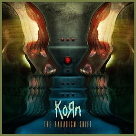 Обложка альбома Korn «The Paradigm Shift» (2013)