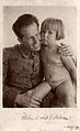 Пётр Демант на руках у отца, Зигмунда Деманта. 2 августа 1921 года