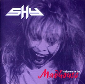 Обложка альбома Shy «Welcome to the Madhouse» (1994)