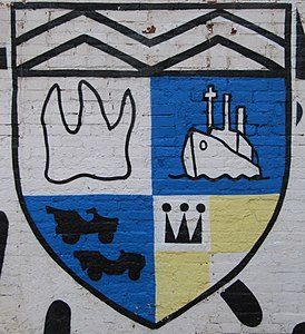 Escudo de armas de Shvambrania en la pared de la plaza Shvambrania