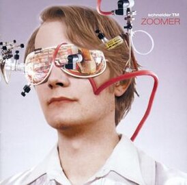 Обложка альбома Schneider TM[англ.] «Zoomer» (2002)