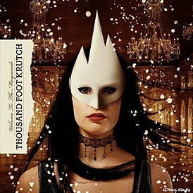 Обложка альбома Thousand Foot Krutch «Welcome to the Masquerade» (2009)