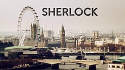 A view of the London skyline, with the word "Sherlock" in black letters
