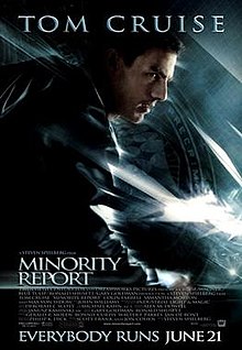 A man wearing a leather jacket stands in a running pose. A flag with the PreCrime insignia stands in the background. The image has a blue tint. Tom Cruise's name stands atop the poster, and the title, credits, and tagline "Everybody Runs June 21" are on the bottom.