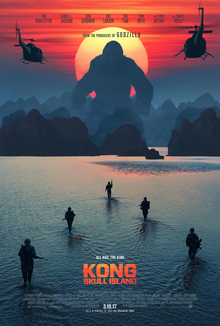Kong standing right front of the sun, near the hills and Soldiers chasing him in the water.