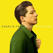 An image of Puth sporting a green jacket, posing a front a yellow backdrop, with his name and the title, "Nine Track Mind" appearing in the portrait's center.