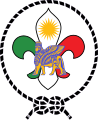 伊拉克庫爾德斯坦童軍的徽章，結合了亞述人的保護神捨杜，特徵是人頭、牛身與鳥羽[7]。