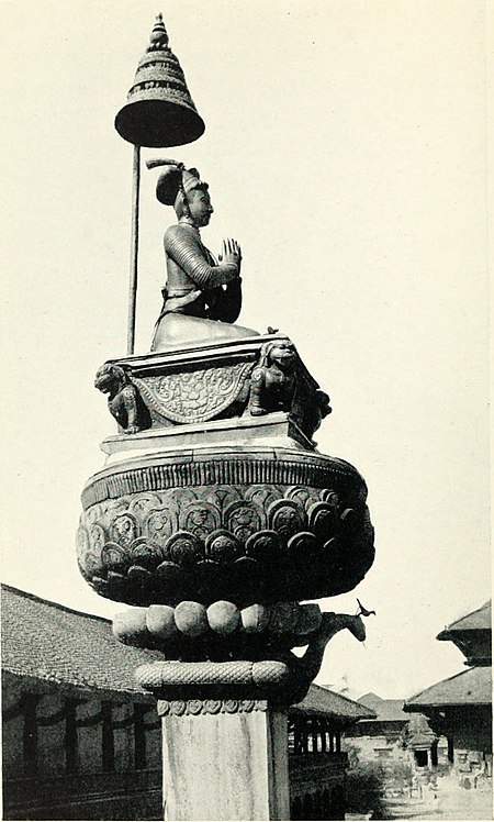 Black and white photograph of metal statue of Raja Bhupatindra Mall, Durbar Square, Bhatgaon.