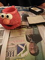 Elmo cup is used to contain water, which is used to moisturize the blocks to promote cohesive attraction