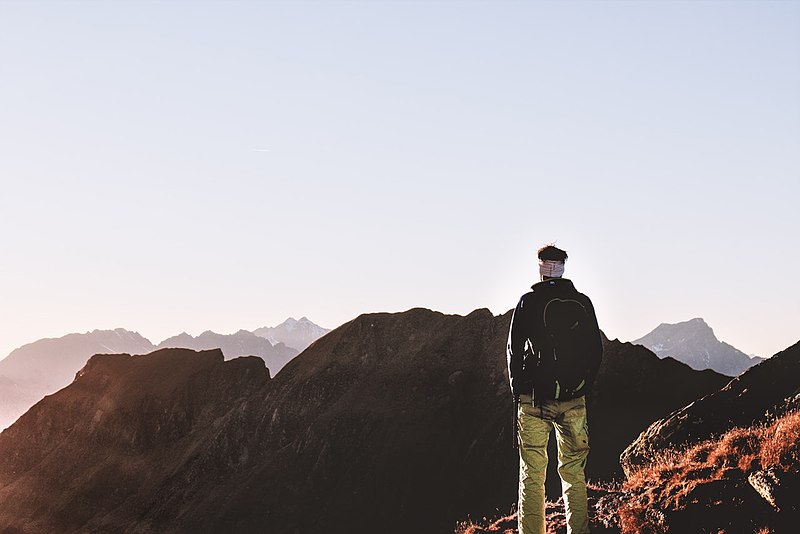 File:Backpack-climber-clouds-691716.jpg