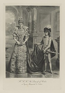 Black-and-white photograph of a standing woman and young girl dressed as a boy holding her train in historical costumes